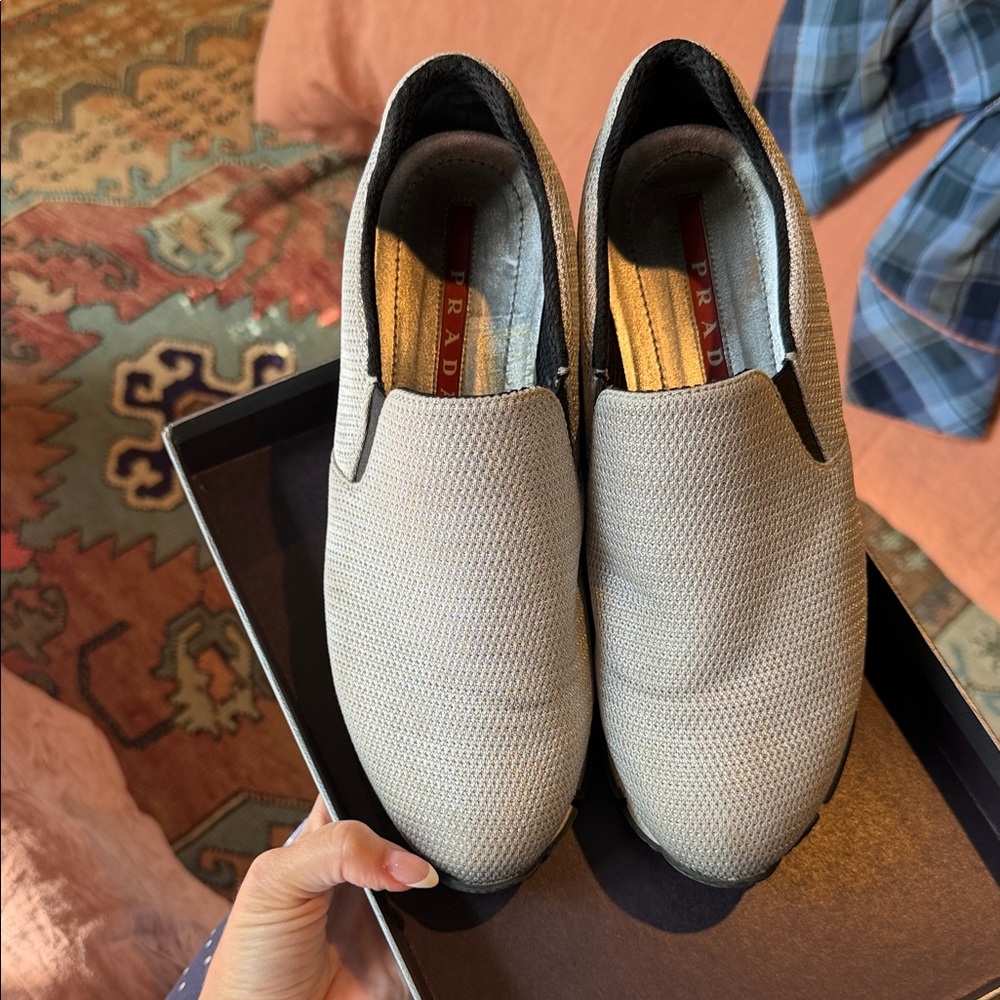 Silver Prada slip on sneakers